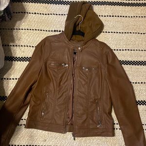 Zipped up brown jacket
